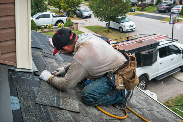 Professional Roof Replacement technician working in Bruington, VA